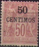 '50 CENTIMOS' on 50 c red