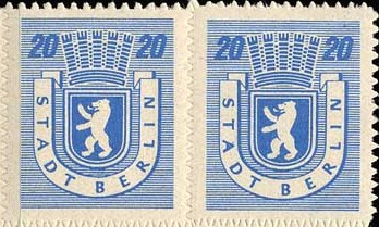 Two stamps with zig-zag perforation in between